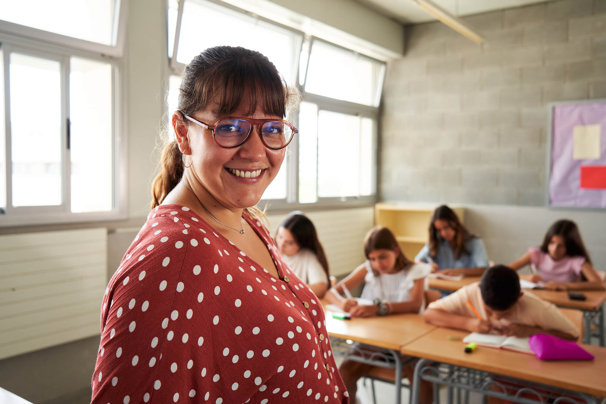 Portrait of a teacher looking at camera smiling wh 2026 03 09 00 15 17 utc